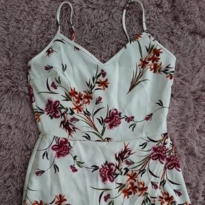 Flowered romper with half skirt detail